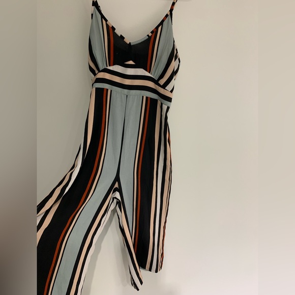 Stripped romper with adjustable straps. - Picture 1 of 6